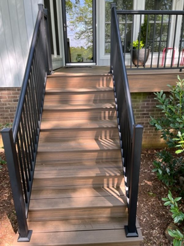 Trex Toasted Sand deck boards with RDI Avalon Aluminum Railings