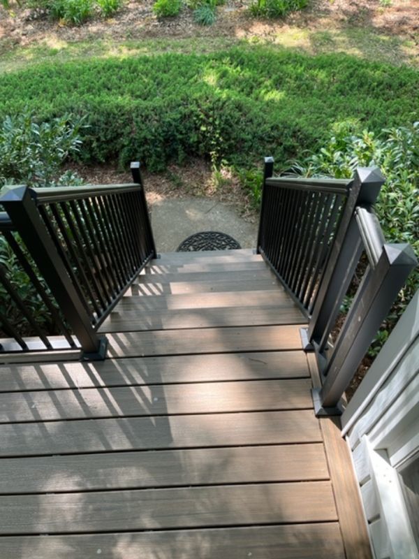 Trex Toasted Sand deck boards with RDI Avalon Aluminum Railings